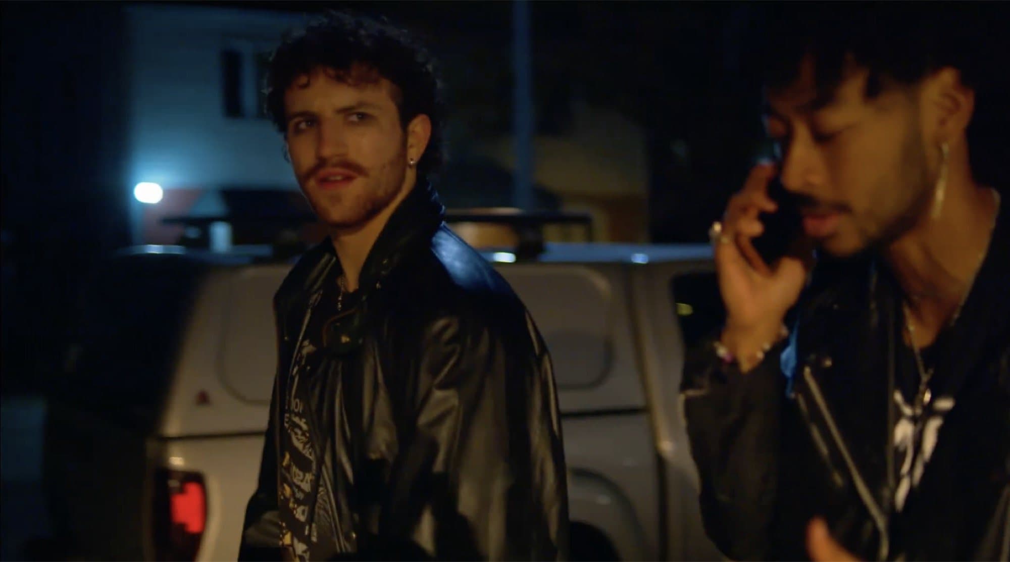 AJ DeAugustine at night in a leather jacket in Soul Mates